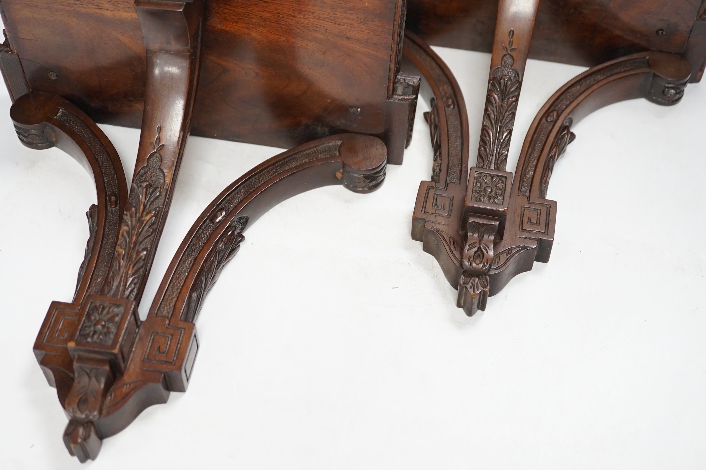 A pair of Edwardian Sheraton Revival mahogany wall brackets, 28cm high. Condition - fair to good